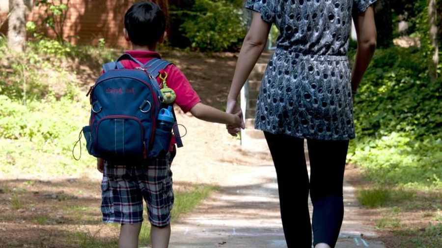 Is she walking to school. Is she walking to school